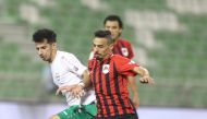 Al Rayyan and Al Ahli players vie for the ball possession during their Ooredoo Cup Round 2 match played at the Al Ahli Stadium, yesterday.