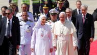 Pope Francis flanked by a Salesian nun Ana Rosa Sivori, who is his cousin, arrives at a military air terminal in Bangkok, Thailand November 20, 2019. REUTERS/Remo Casilli