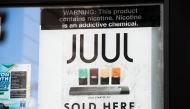 In this file photo taken on September 17, 2019 A sign advertises juul vaping products in Los Angeles, California. New York on November 19, 2019 became the second state this week to sue juul, the United States' largest electronic cigarette manufacturer, fo