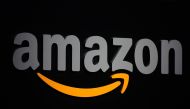 In this file photo taken on September 28, 2011 the Amazon logo is seen on a podium during a press conference in New York / AFP / Emmanuel DUNAND
