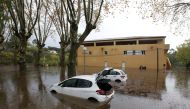 Cars are seen on a flooded street after heavy rain fall in Roquebrune-sur-Argens, France, November 24, 2019. REUTERS/Eric Gaillard