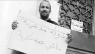 Fouad Ouicher of the Youth Action Rally was charged alongside Saida Deffeur, one of the organisation's activists, said lawyer Seddik Mouhous.  (Twitter image courtesy of Khaled Drareni @khaleddrareni)