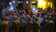 Lebanese army soldiers and riot police are deployed after clashes broke out between anti-government demonstrators and supporters of the Shi'ite movements Hezbollah and Amal in Beirut, Lebanon, November 25, 2019. REUTERS/Mohamed Azakir