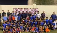 Head coach of the Kerala state Santosh Trophy team and the technical director of I-League club Gokulam Kerala FC Bino George with Absolute Sports Academy kids 