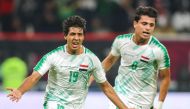 Iraq forward Mohammed Qasim celebrates his goal during the 24th Arabian Gulf Cup Group A football match between Qatar and Iraq at the Khalifa International Stadium in Doha on November 26, 2019. AFP / Karim Jaafar