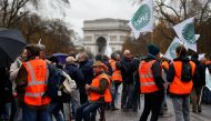 French farmers gather near the Arc de Triomphe in Paris, protesting against low farm incomes and growing criticism of agricultural practices, France, November 27, 2019. Reuters/Pascal Rossignol