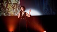 In this picture taken on November 28, 2019, Meagen Reyes of the Philippines sings during the Karaoke World Championships in Tokyo. AFP / Behrouz Mehri
 