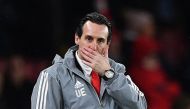 (FILES) In this file photo taken on November 28, 2019, Arsenal's Spanish head coach Unai Emery (L) reacts as Eintracht Frankfurt Adolf Hutter gestures at the UEFA Europa league Group F football match between Arsenal and Eintracht Frankfurt at the Emirates