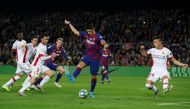 Barcelona's Luis Suarez scores their fourth goal REUTERS/Albert Gea