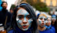 People attend an Extinction Rebellion protest against climate change as the COP25 climate summit is held in Madrid, Spain December 8, 2019. Reuters/Javier Barbancho