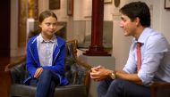 FILE PHOTO: Prime Minister Justin Trudeau greets Swedish climate change teen activist Greta Thunberg before a climate strike march in Montreal, Quebec, Canada, September 27, 2019. Reuters /  Andrej Ivanov