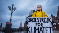 Greta Thunberg holds a placard reading ‘School strike for the climate’ outside the Swedish parliament in Stockholm, Nov 30, 2018. TT News Agency / Hanna Franzen / Reuters. 