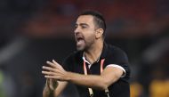 Sadd's coach Xavi reacts during the 2019 FIFA Club World Cup football match between Qatar's Al-Sadd and New Caledonia's Hienghene Sport at the Jassim Bin Hamad Stadium in the Qatari capital Doha on December 11, 2019. / AFP / KARIM JAAFAR