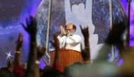 Actor Rajinikanth greets his supporters after announcing the launch of his political party in Chennai, India, December 31, 2017. REUTERS/P. Ravikumar