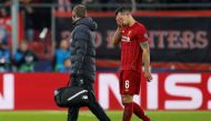 Liverpool's Dejan Lovren looks dejected as he is substituted off after sustaining an injury. (Reuters/John Sibley)