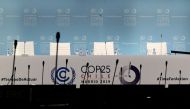 Empty chairs are pictured during the UN Climate Change Conference COP25 at the 'IFEMA - Feria de Madrid' exhibition centre, in Madrid, on December 13, 2019.  AFP / Cristina Quicler
 