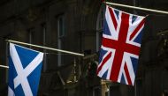 Flags of Scotland and the Union hang from flagpoles in Edinburgh, Scotland on April 11, 2019. AFP / Andy Buchanan