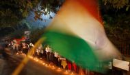 Local residents take part in a candle light vigil to show solidarity with the students of the Jamia Millia Islamia university after police entered the university campus on Sunday following a protest against a new citizenship law, in New Delhi, India Decem