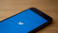 (FILES) In this file photo taken on July 10, 2019 The Twitter logo is seen on a phone in this photo illustration. AFP / Alastair Pike