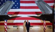 US President Donald Trump and First lady Melania Trump arrive for a signing ceremony on S.1790, the 