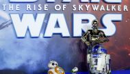 Star Wars robots pose as they attend the premiere of 