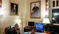 Senate Democratic Leader Chuck Schumer (D-NY) watches the vote count in his Capitol Hill office as the US House of Representatives votes on the first of two articles of impeachment against US President Donald Trump in Washington, December 18, 2019. Reuter
