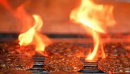 Veggie burgers are cooked over a flame on a grill in Greenwich, Connecticut, US, on June 26, 2017. Reuters / Adrees Latif