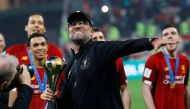 Liverpool manager Juergen Klopp celebrates with the trophy after winning the Club World Cup, Liverpool v Flamengo, Khalifa International Stadium, Doha, December 21, 2019  Reuters/Kai Pfaffenbach