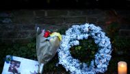Tributes are seen outside the home of former singer George Michael after his sister, Melanie Panayiotou, 55, was found dead on Christmas Day, in London, Britain December 27, 2019. Reuters/Hannah McKay