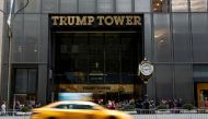 People gather outside the 5th Avenue entrance to Trump Tower in New York City, April 10, 2018. Reuters / Brendan McDermid