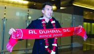 Croatian international Mario Mandzukic poses for a picture upon his arrival in Doha. 