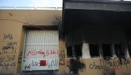 A picture shows the entrance leading to the US embassy in the capital Baghdad on January 2, 2020, which was damaged the day before by Hashed supporters. AFP / Ahmad Al-Rubaye 