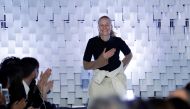 Yolanda Zobel acknowledges the audience at the end of the Courregs Women's Fall-Winter 2019/2020 Ready-to-Wear collection fashion show in Paris on February 27, 2019.  AFP / Thomas Samson 