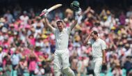 Australia’s Marnus Labuschagne (C) celebrates scoring a double century during the second day of the third cricket Test match between Australia and New Zealand at the Sydney Cricket Ground in Sydney on January 4, 2020./ AFP / JEREMY NG / --