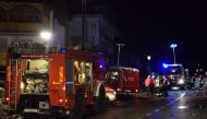 This handout photo taken and released on January 5, 2020 by the Italian Department of firefighters, the Vigili del Fuoco, shows rescuers intervening after a road accident at the ski resort of Lutago. AFP PHOTO / VIGILI DEL FUOCO