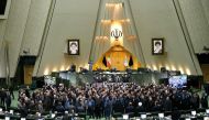 A handout picture provided by the Iranian Parliament news agency on January 5, 2020 shows Iranian MPs chanting 