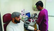 A man donates blood during the campaign in Al Shamal Municipality. 