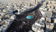 People attend a funeral procession for Iranian Major-General Qassem Soleimani, head of the elite Quds Force, and Iraqi militia commander Abu Mahdi al-Muhandis, who were killed in an air strike at Baghdad airport, in Tehran, Iran January 6, 2020. Official 