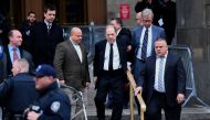 Harvey Weinstein(C) leaves the Manhattan Criminal Court, on January 6, 2020 in New York City.  AFP / Johannes Eisele
 