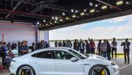 The Porsche Taycan electric car is presented to the public as a world premiere on September 4, 2019 in a hall of the airfield of Neuhardenberg, eastern Germany. AFP / DPA / Patrick Pleul