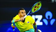 Nick Kyrgios of Australia hits a return against Stefanos Tsitsipas of Greece during the men's singles match on day five of the ATP Cup tennis tournament in Brisbane on January 7, 2020. AFP / Patrick Hamilton 