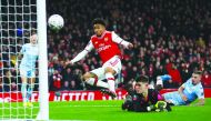 Arsenal's Reiss Nelson scores their first goal. Reuters/Eddie Keogh