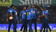 Sri Lanka's team celebrate the wicket of India's K. L. Rahul (unseen) during the second T20 international cricket match of a three-match series between India and Sri Lanka at the Holkar Cricket Stadium in Indore on January 7, 2020. / AFP / Indranil MUKHER