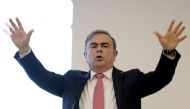 Former Renault-Nissan boss Carlos Ghosn gestures as he addresses a large crowd of journalists on his reasons for dodging trial in Japan, where he is accused of financial misconduct, at the Lebanese Press Syndicate in Beirut on January 8, 2020. AFP / JOSEP
