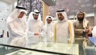 Qatar University President, Dr. Hassan Al Derham, at the university's booth at the Fair. 