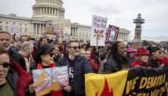 Actor Joaquin phoenix (4L) and actress Susan Sarandon (2L) demonstrate during Fonda-Fire Drill Friday with actress Jane Fonda (R) outside the Capitol for the last time protesting fossil fuel companies in Washington, DC, on January 10, 2020. / AFP / JIM WA