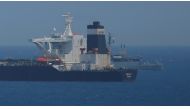 A British Royal Navy patrol vessel guards the oil supertanker Grace 1 as it sits anchored in waters of the British overseas territory of Gibraltar, July 4, 2019. Reuters / Jon Nazca