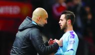 Manchester City manager Pep Guardiola with Bernardo Silva, Carabao Cup, Semi Final First Leg, Manchester United v Manchester City, Old Trafford, Manchester.  January 7, 2020. Reuters/Phil Noble