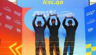 The podium winners at the Qatar Touring Car Championship pose for a picture at the Losail International Circuit