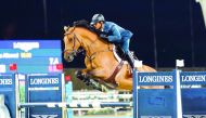Kamil Sabitov guiding Quintendro over an obstacle during the Medium Tour competition of the fifth Round of Longines Hathab Equestrian Tour, in this file photo.